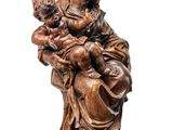 an image of a statue of a woman holding a child