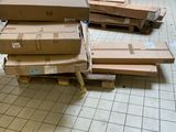 a pile of boxes sitting on the floor in a room