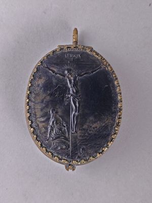 an image of a medal with a jesus on it