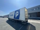 a semi truck that is parked in a parking lot