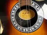 a close up of a guitar with a label on it