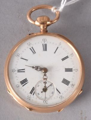 a gold pocket watch with roman numerals on it