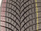 a close up of a tire with a yellow line on it