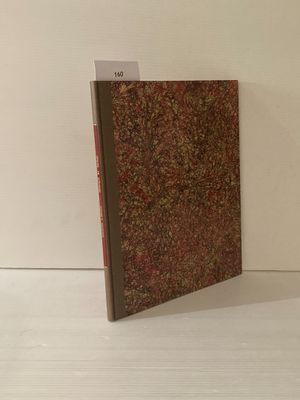 un livre posé sur une table blanche