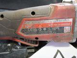 an image of a close up of an electric tool on a table