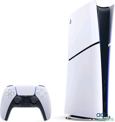 une console de jeux vidéo blanche et noire à côté d'une manette