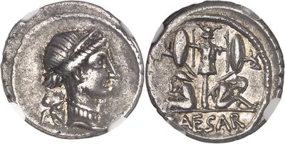 a silver coin with an image of a woman on it