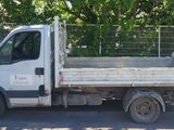 a white truck that is parked on the side of the road