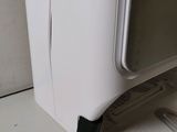 a white washer and dryer sitting on a counter