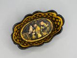 yellow and black plate with a picture of a man and a woman