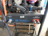 an image of a machine that is in a garage