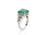 an emerald and diamond ring