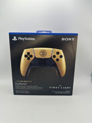un gros plan d'une boîte contenant une manette de jeu