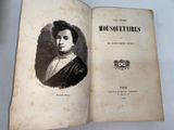 an old book with a picture of a woman on it