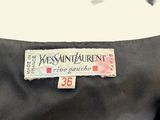 an image of a label on a black dress that says kessan laurent