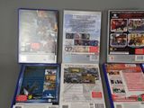 a lot of video games on the table together