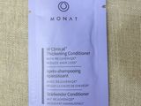 a packet of monat conditioning conditioner sitting on top of a table