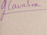 a close up of a piece of paper with a purple writing on it
