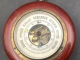 a clock that is hanging on the wall on the wall