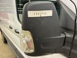 an image of a van with a sticker on it ' s side mirror
