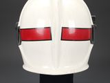 a close up of a helmet with red stripes on it