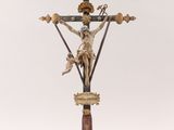 an image of a statue of jesus on a cross on a white background