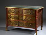 a chest of drawers with a marble top on a stand