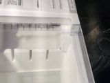 a white box with a white lid sitting on top of a table