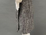 an image of a mannequin mannequin wearing a white shirt and black skirt