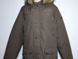 an image of a brown jacket with a hood on a mannequin stand