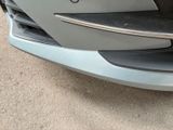 a close up of the front bumper of a car