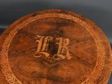a wooden table with a clock on top of it
