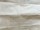 a piece of paper that has a letter written on it
