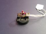 a ring that is sitting on top of a button