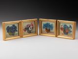 three framed pictures of flowers in vases on a table