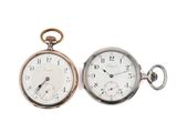 an image of a close up of a pocket watch on a white background
