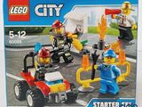une boîte contenant un ensemble Lego City