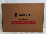 a box of scutum led monitor fragile handle with care