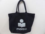 black tote bag with white logo on it