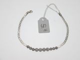 a close up of a bracelet with a price tag on it