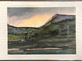framed watercolor painting of a landscape with a mountain in the background