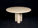 a round table with four legs and a wooden top