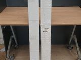 two boxes stacked on top of each other on a table