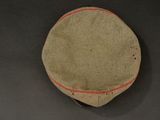 an image of a military cap with a red stripe