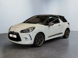 a white citrole is parked in a white room