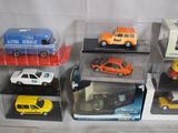 a lot of toy cars that are in a display case