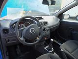 dashboard of a car with a steering wheel and dashboard controls