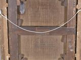 a picture of an old wooden box with a rope