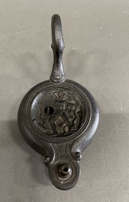 a small metal object that is sitting on a table