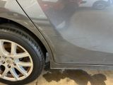 a close up of a car ' s tire on the ground